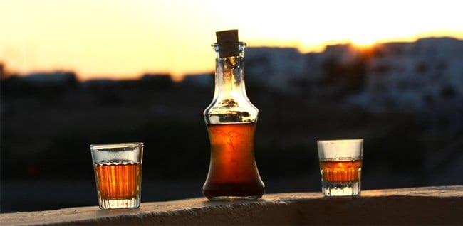 A "Rakomelo" with shot glasses