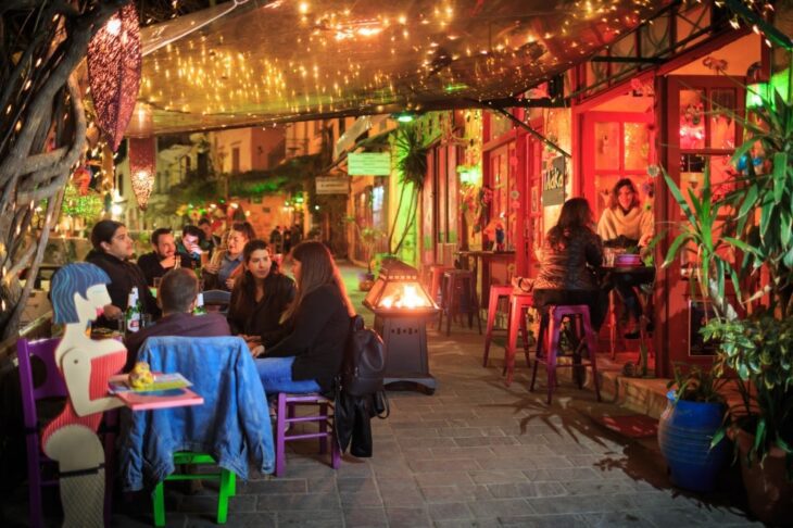 People drinking and eating -out on a night in Chania