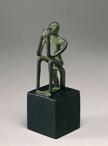 Seated male figure